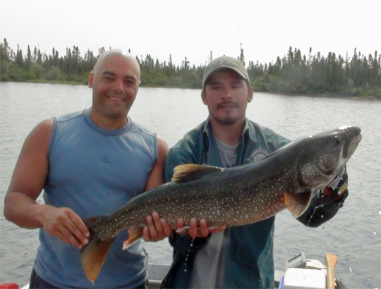 Martin Piette (left) with Master Angler Lake Trout at North Knife Lake Lodge