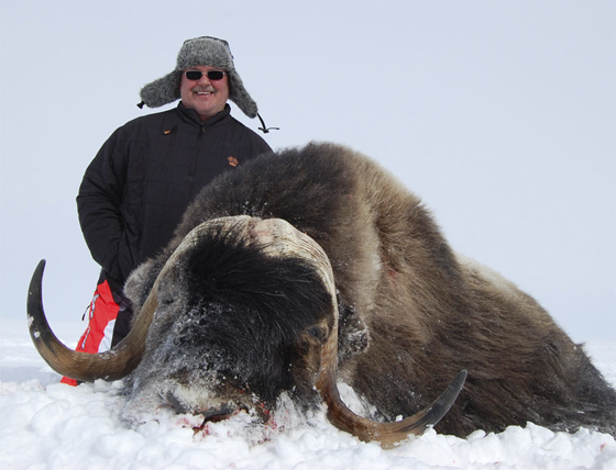 Dave from Saskatchewan with his deep, long curling bull.