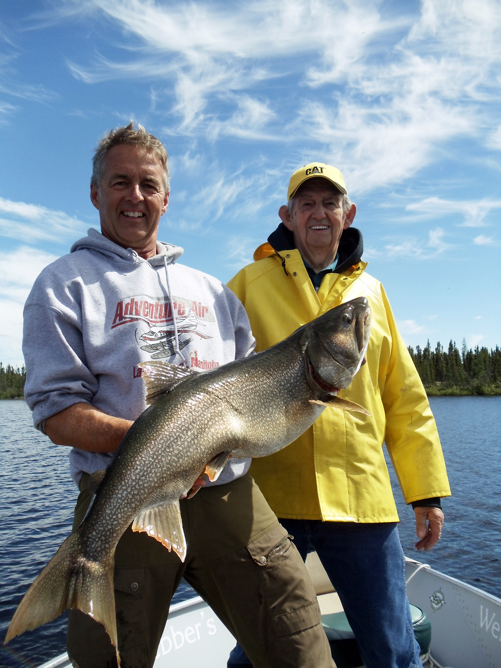 Another Master Angler lake trout for Dad Reimer (right) at North Knife Lake Lodge.