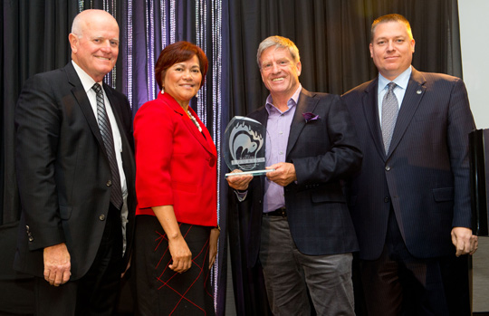 Doug Webber, founder of Webber’s Lodges, receives Winnipeg Airport Authority Award of Distinction from Travel Manitoba