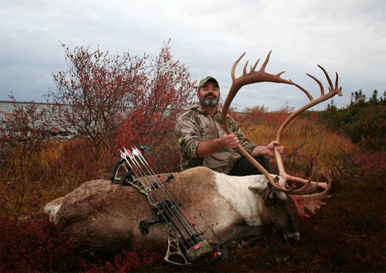 Camp Manager Troy with caribou taken 300 yards from camp.