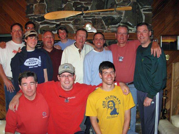 Vukelic family at North Knife Lake Lodge. Paul Vukelic far right in green jacket. Friend Mike Gomel to his left in orange. .