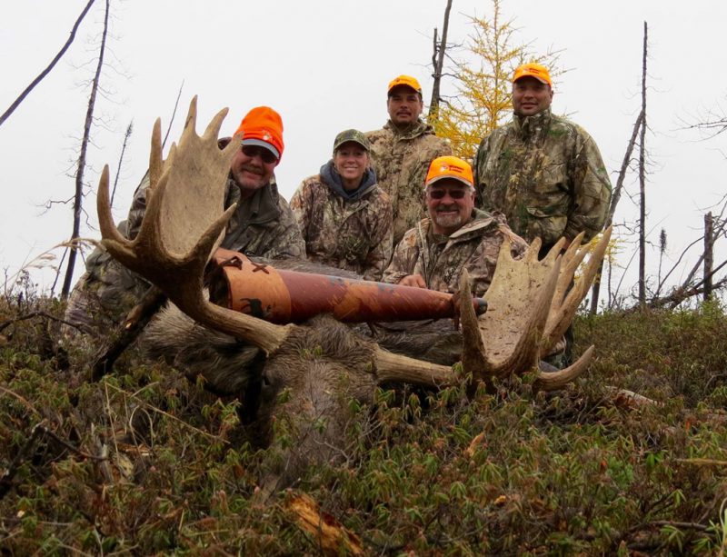 Ed Coleman, Ladonna Coleman and Ward Rabb with bull moose at Webber's Lodges.