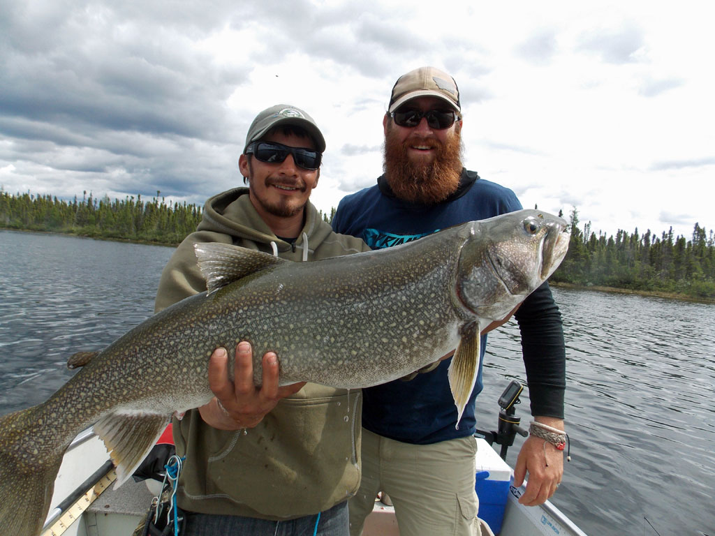 Sometimes the cameraman gets to fish! Matt Young with his Master Angler Lake Trout!